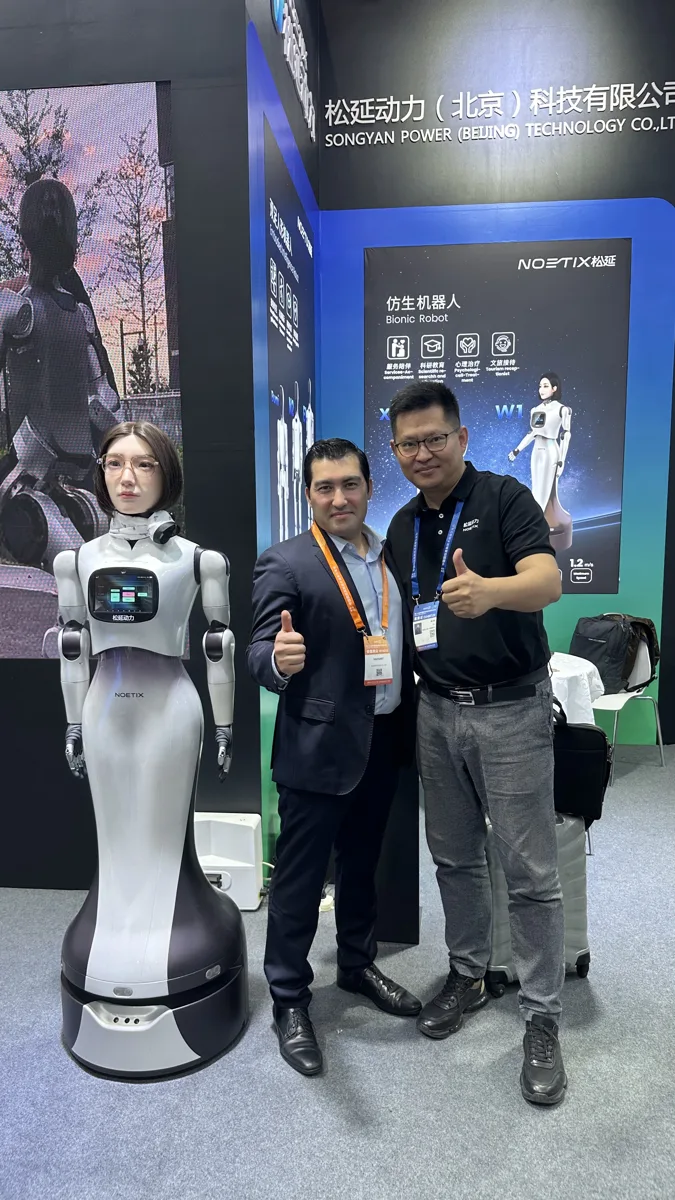 Humanoid robot demo, photographed on the show floor in 2025